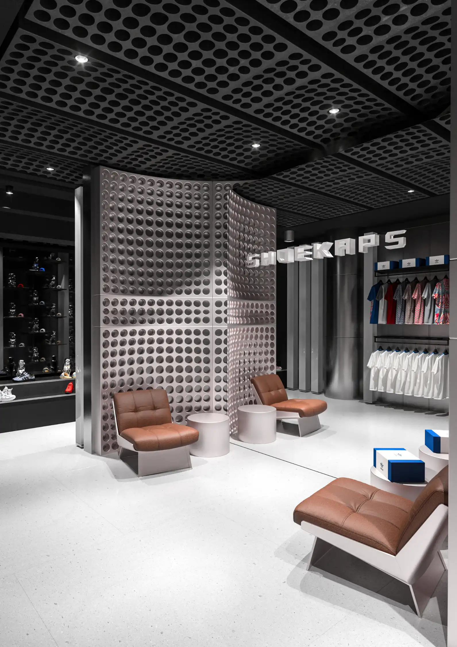 Futuristic LED tube lighting and perforated metal wall design